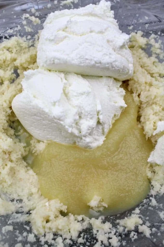 Gluten-Free Ricotta Cookies Process Step 2a Addition of ricotta and applesauce to the creamed mixture in a large glass bowl.